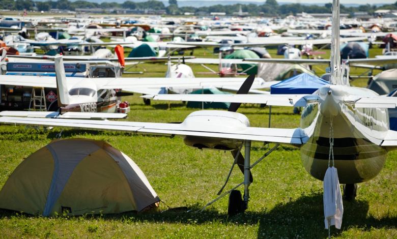 Planes on the field at EAA AirVenture Oshkosh, and plenty of tents under wings [Credit: FLYING Archive]