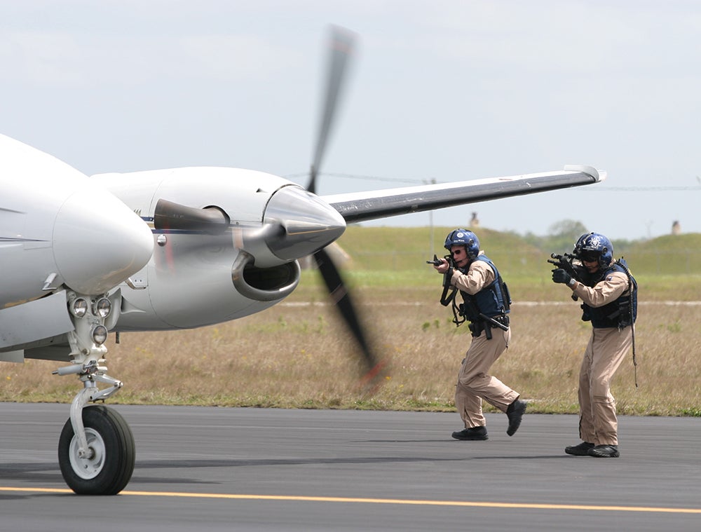 top2013-cbp-officers-plane.jpg
