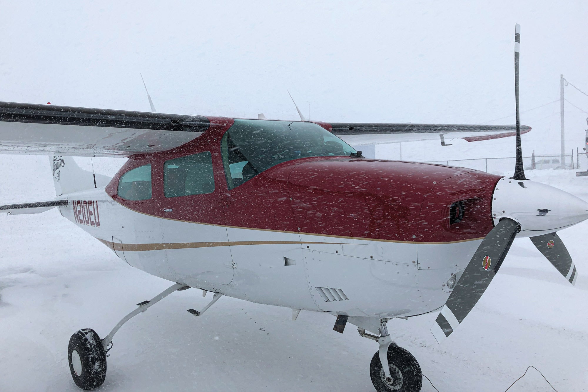 airplane parked in snow