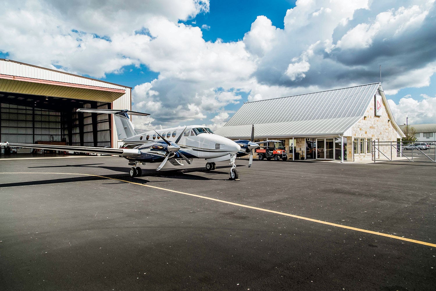 plane in front of hangar