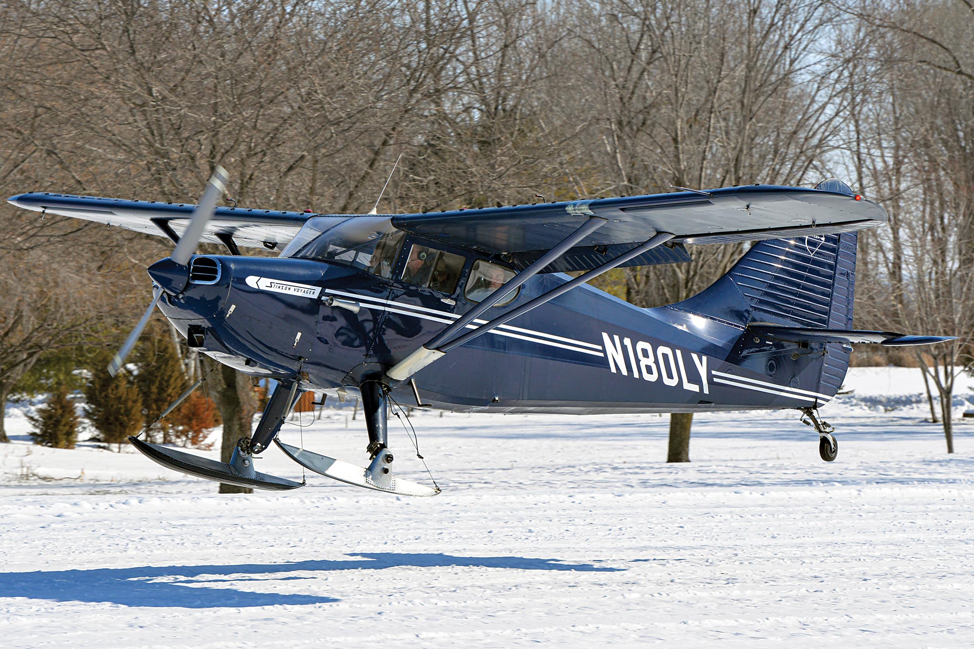 Stinson 108 classic aircraft on skis