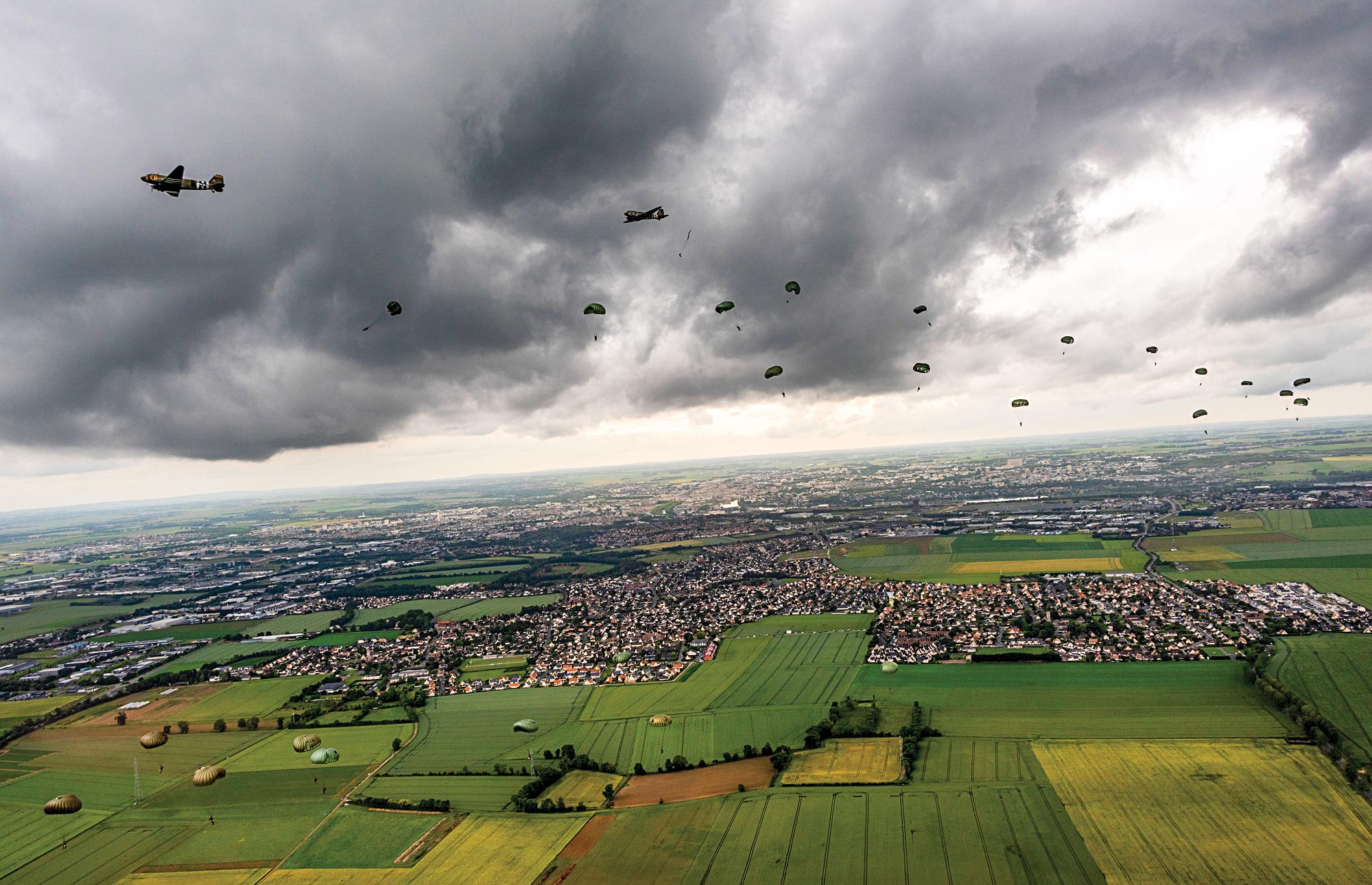 airplane drops over Normandy