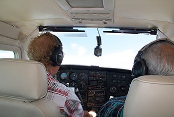 Passenger view from the back seat of a GA airplane [Shutterstock]