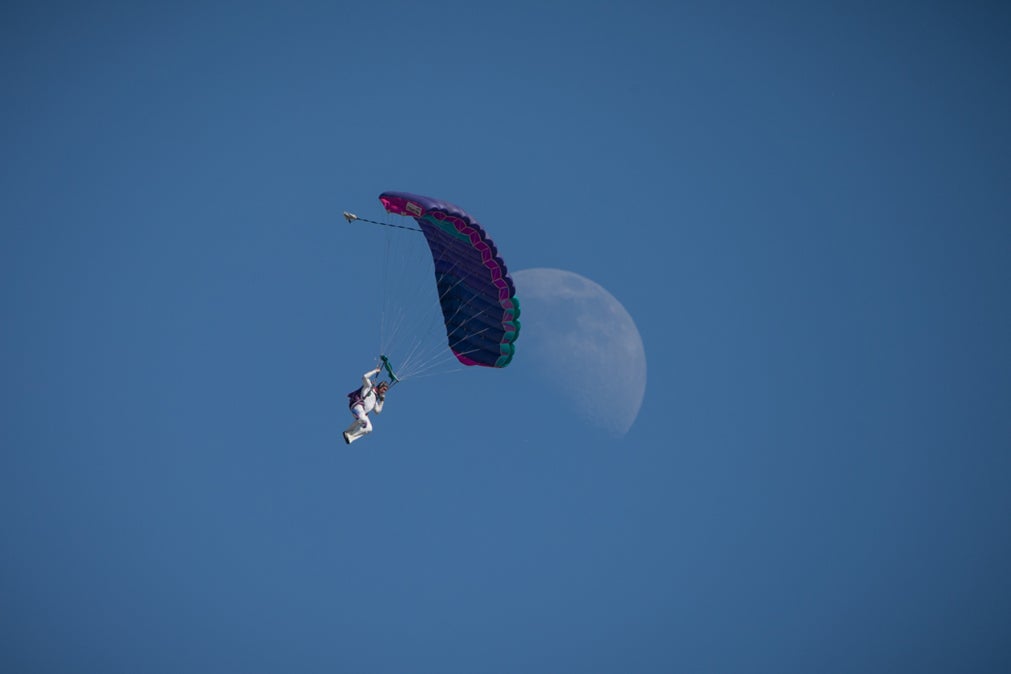 osh15-jv-parachute-jumper-in-front-of-the-moon.jpg