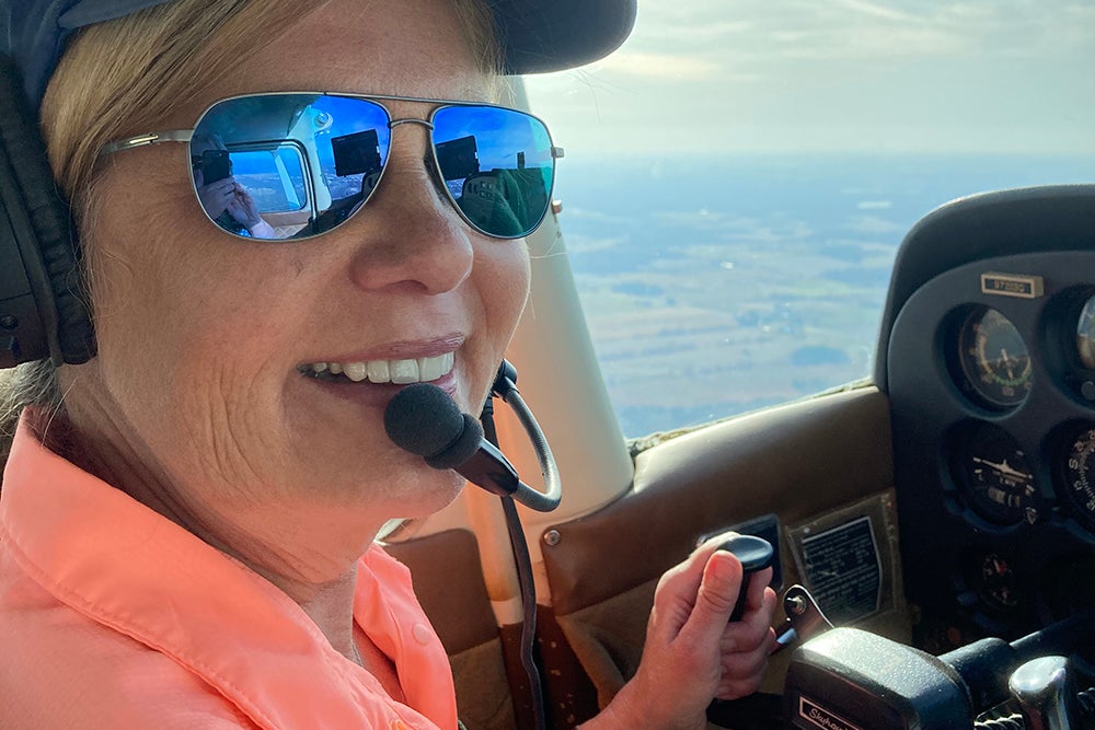 Ellen enjoys some time in her aircraft.