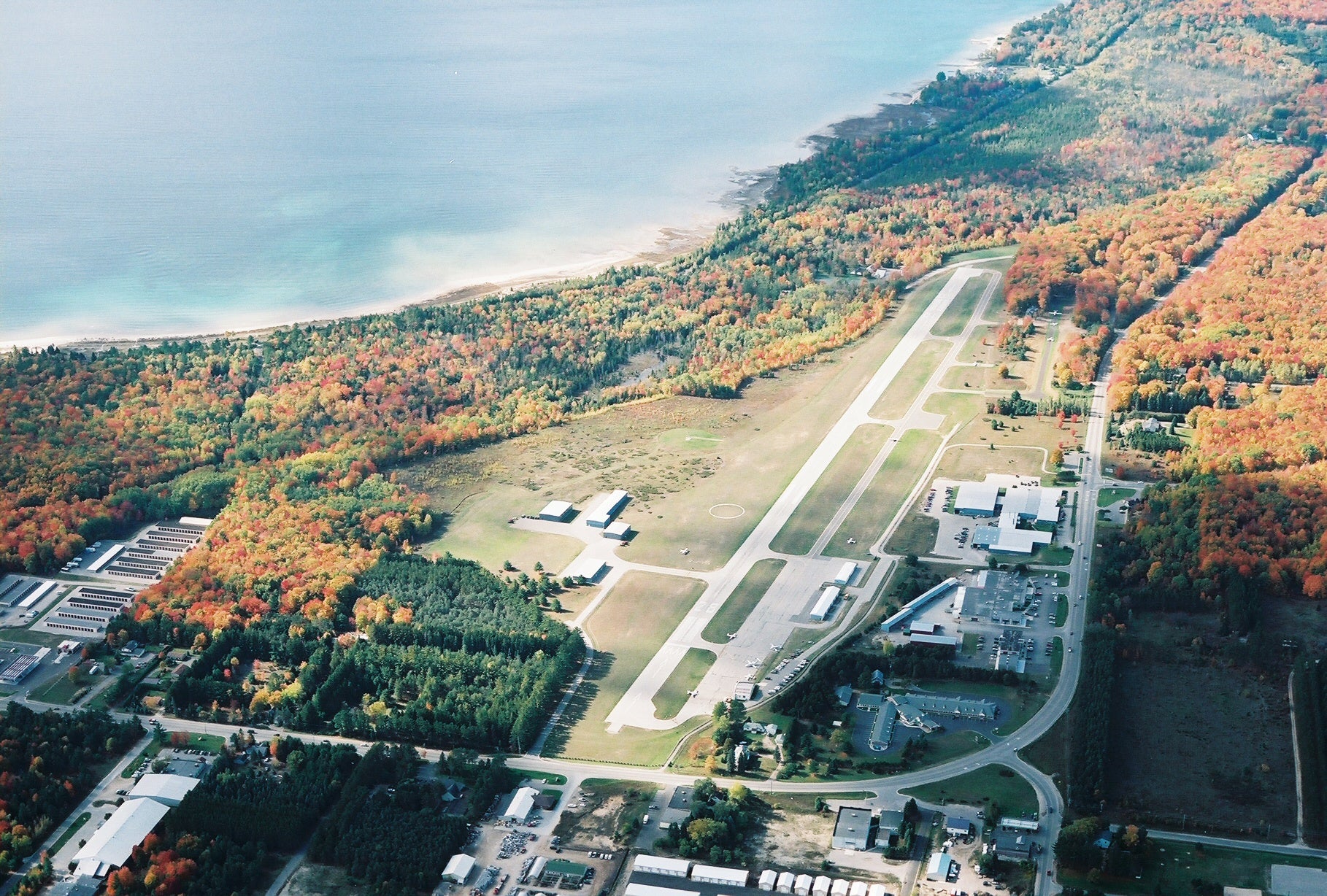 An aerial view of Harbor Springs Airport (KMGN).