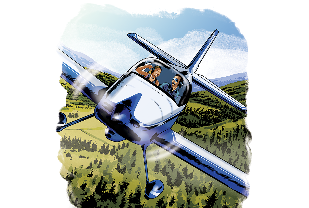 A couple appears to be talking as they fly over a field in a small aircraft.