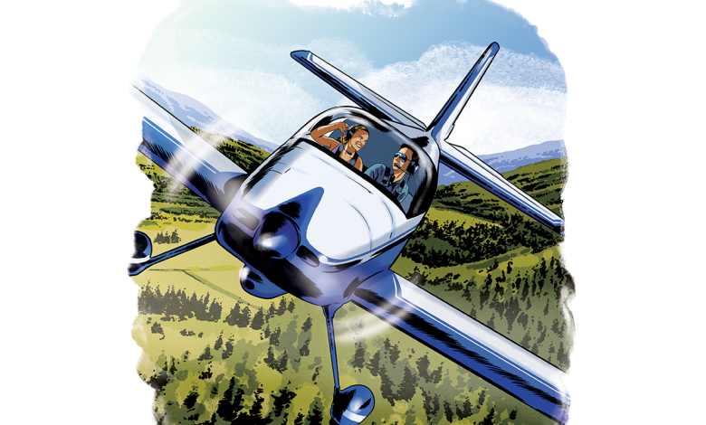 A couple appears to be talking as they fly over a field in a small aircraft.