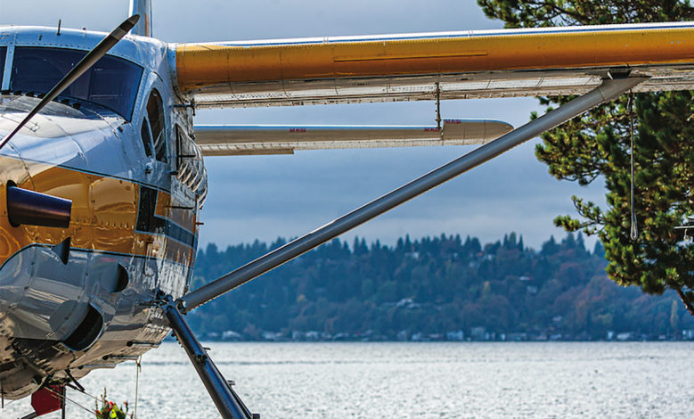 A DHC-3 Otter floats on a lake