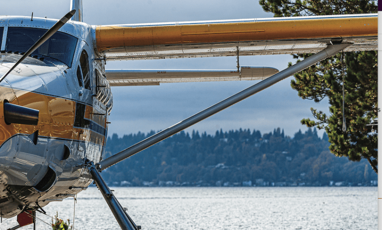 A DHC-3 Otter floats on a lake