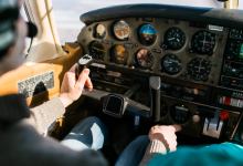 Flight instructor and student inside small Piper aircraft [Credit: FLYING Archive]