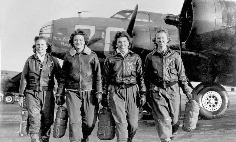 Women Airforce Service Pilots (WASPs) Frances Green, Margaret (Peg) Kirchner, Ann Waldner and Blanche Osborn (left to right) leaving their B-17 Flying Fortresses, Pistol Packin' Mama, at the four engine school at Lockbourne AAF, Ohio. [Photo: U.S. Air Force]