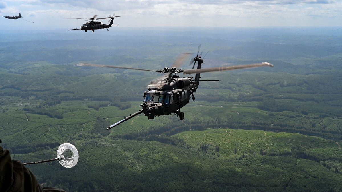 U.S. Army MH-60 Black Hawk helicopters from the 160th Special Operations Aviation Regiment perform aerial refueling at Joint Base Lewis-McChord, Washington, on June 14, 2023. [Courtesy: U.S. Air Force ]