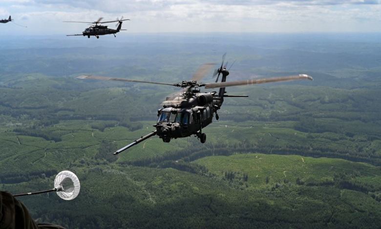 U.S. Army MH-60 Black Hawk helicopters from the 160th Special Operations Aviation Regiment perform aerial refueling at Joint Base Lewis-McChord, Washington, on June 14, 2023. [Courtesy: U.S. Air Force ]