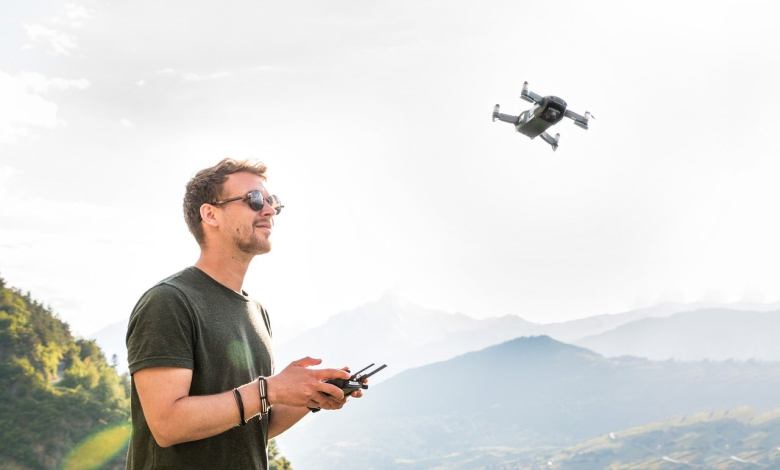 Man operating drone