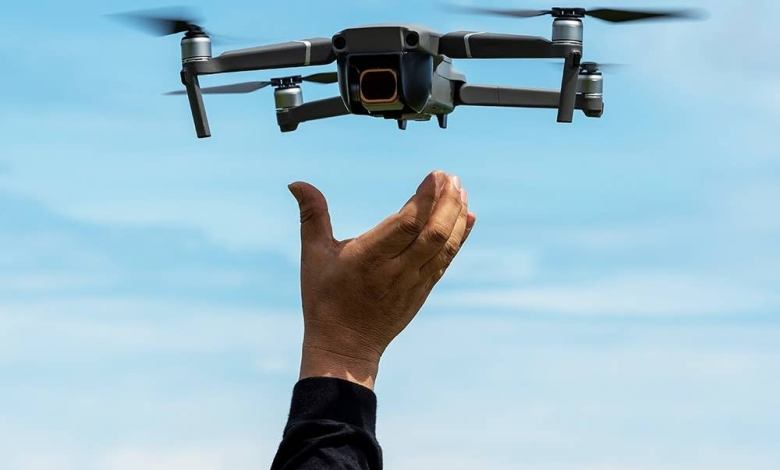 Man releasing a drone