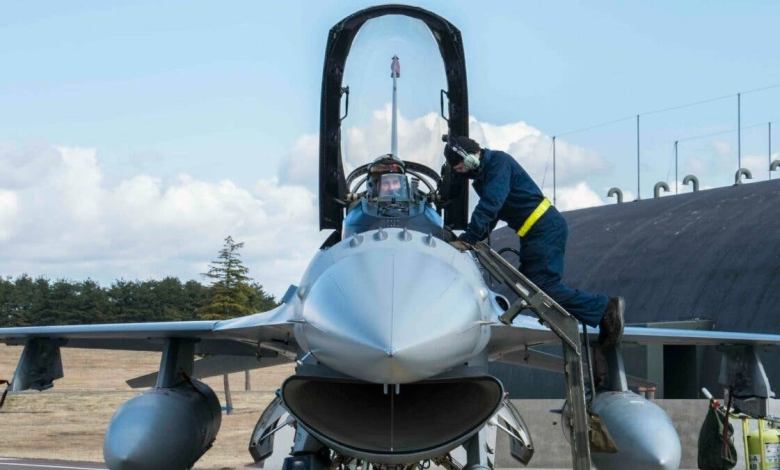 Military pilot in cockpit photo