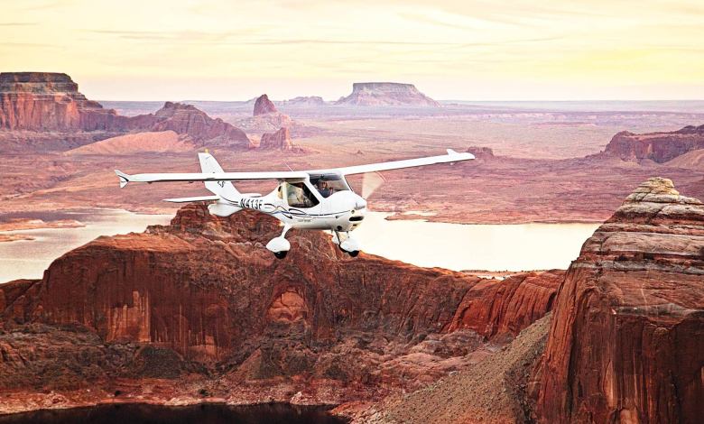 Plane flying over canyon