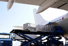 Air cargo specialists are responsible for organizing, planning, loading, and unloading cargo from aircraft. [Credit: CanvaPro]