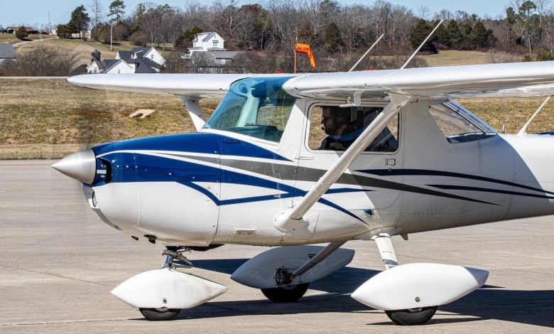 Pilot in plane on ground