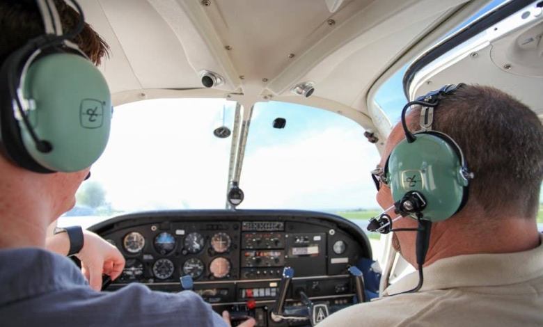 Two people in the cockpit