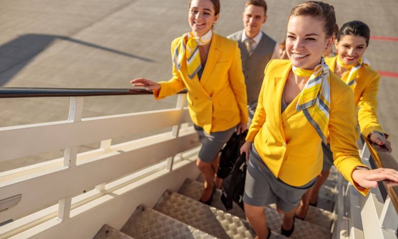 Flight attendants boarding an airplane