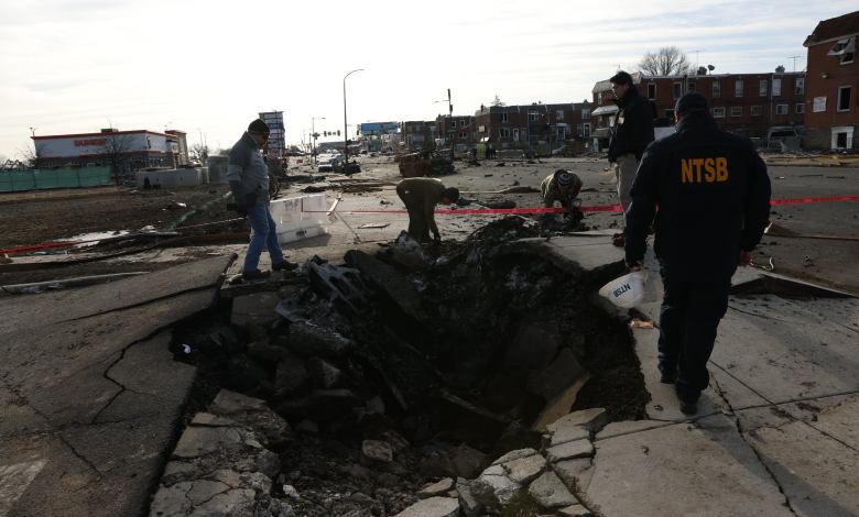 NTSB investigators document the scene of the January 31, 2025, Learjet 55 crash in Philadelphia. [Credit: National Transportation Safety Board]