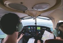 Pilots in the cockpit. [Credit: Shutterstock]