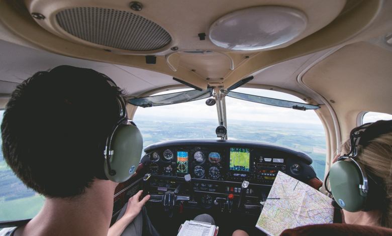 Pilots in the cockpit. [Credit: Shutterstock]