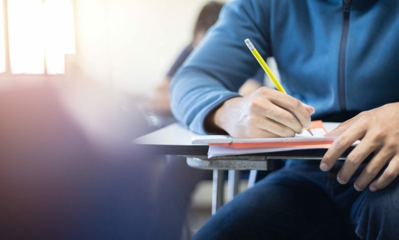 Student in a classroom [Credit: Shutterstock]