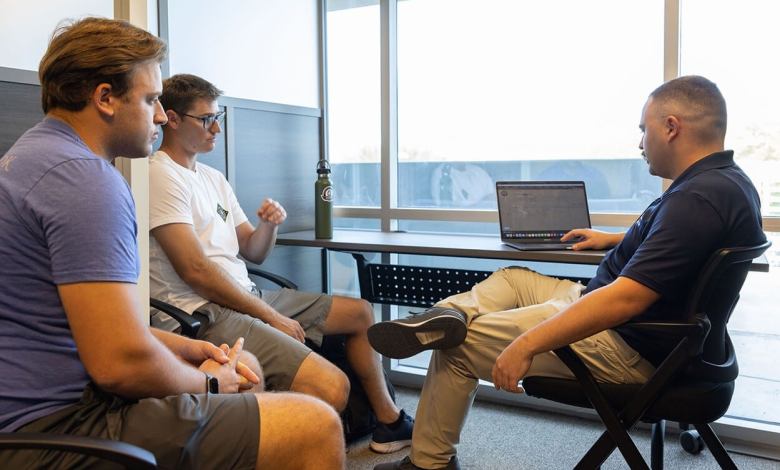 Students working at a flight school
