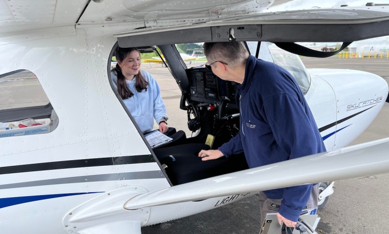 Flight instructor and student