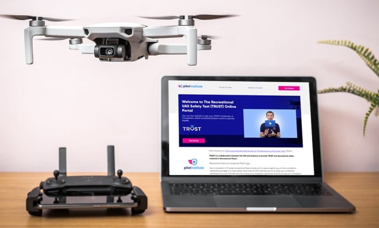 Desk with drone school program on computer
