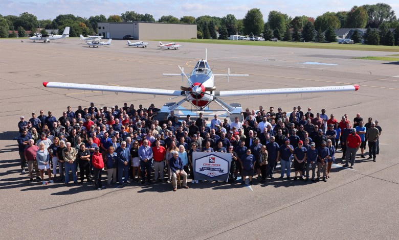 The employees of Wipaire celebrate the delivery of Fire Boss No. 200. [Courtesy: Wipaire]