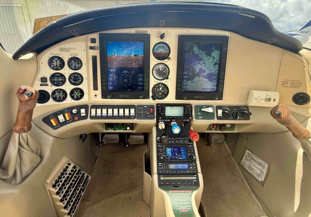 Avidyne-equipped Columbias had portrait PFD and MFD screens, Garmin GNS430 navigators, and S-TEC autopilot. [Courtesy: Sy Pinkert]