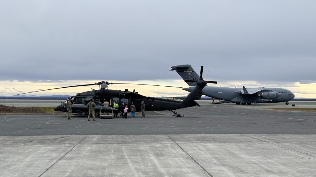 Alaska Air National Guard C-17 Globemaster III aircrew, assigned to the 176th Wing, work with Alaska Army National Guard UH-60L aircrew, with the 207th Aviation Troop Command, to evacuate approximately 300 displaced western Alaska residents from Bethel, Alaska, following Typhoon Halong, Oct. 15, 2025.