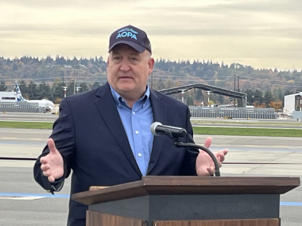 Brad Schuster, Aircraft Owners and Pilots Association Northwest Mountain regional manager, speaks at the reopening ceremony for Boeing Field's GA runway. [Credit: Brad Schuster]