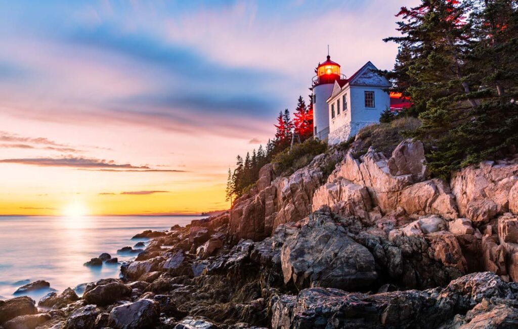 Bass Harbor Head Light Station at sunset. The 167-year-old lighthouse is located within Acadia National Park. [Adobe Stock]