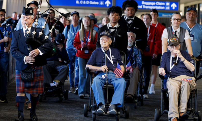 Veterans being led to the gate at Phoenix for one of the final Soaring Valor journeys.