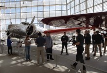 The expedition team gets a close-up look at a Lockheed Electra similar to the one flow by Amelia Earhart at the Museum of Flight in Seattle. [Courtesy: Ted Huetter/Museum of Flight]