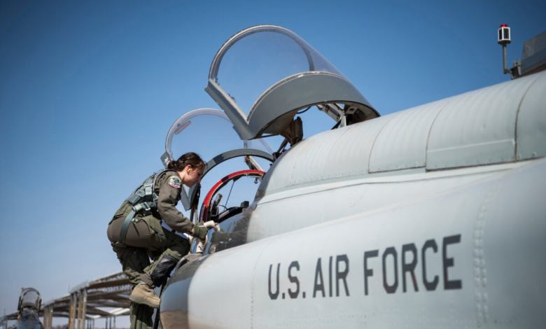 U.S. Air Force pilot boards an aircraft.