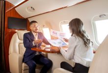 Business meeting in jet cabin [Shutterstock]