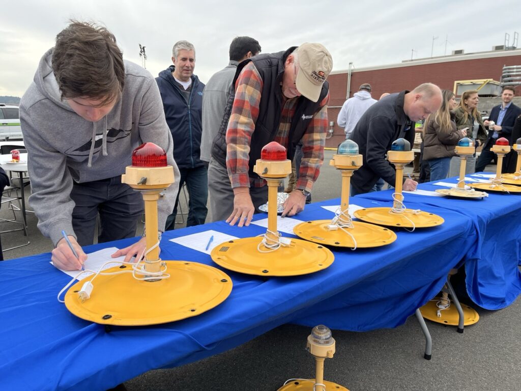 The old runway lights from the Boeing Field renovation project were converted into table lamps and given away as prizes to attendees of the reopening ceremony. [Credit: Brad Schuster]