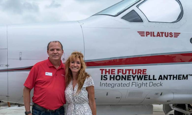 GoAERO CEO Gwen Lighter (right) poses with Bob Buddecke, president of electronic solutions at Honeywell—one of the competition’s many sponsors. [Courtesy: GoAERO]