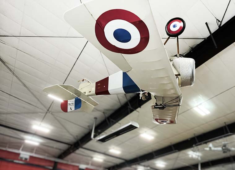 Multiple airplanes hang from the rafters as well at the Heritage Flight Museum. [Credit: Meg Godlewski]