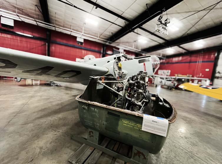 A Beechcraft AT-11 awaits work and restoration in the service hangar. [Credit: Meg Godlewski]