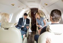 Business meeting on board aircraft [Credit: Shutterstock]