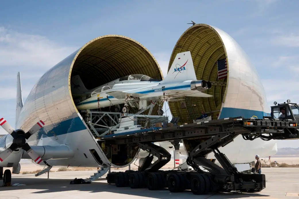 NASA Super Guppy loads T-38 Talon trainer aircraft