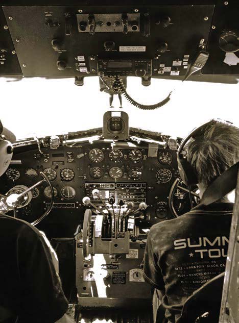 The author (right) reflects on flying all over the country in DC-3s. [Credit: Martha Lunken]