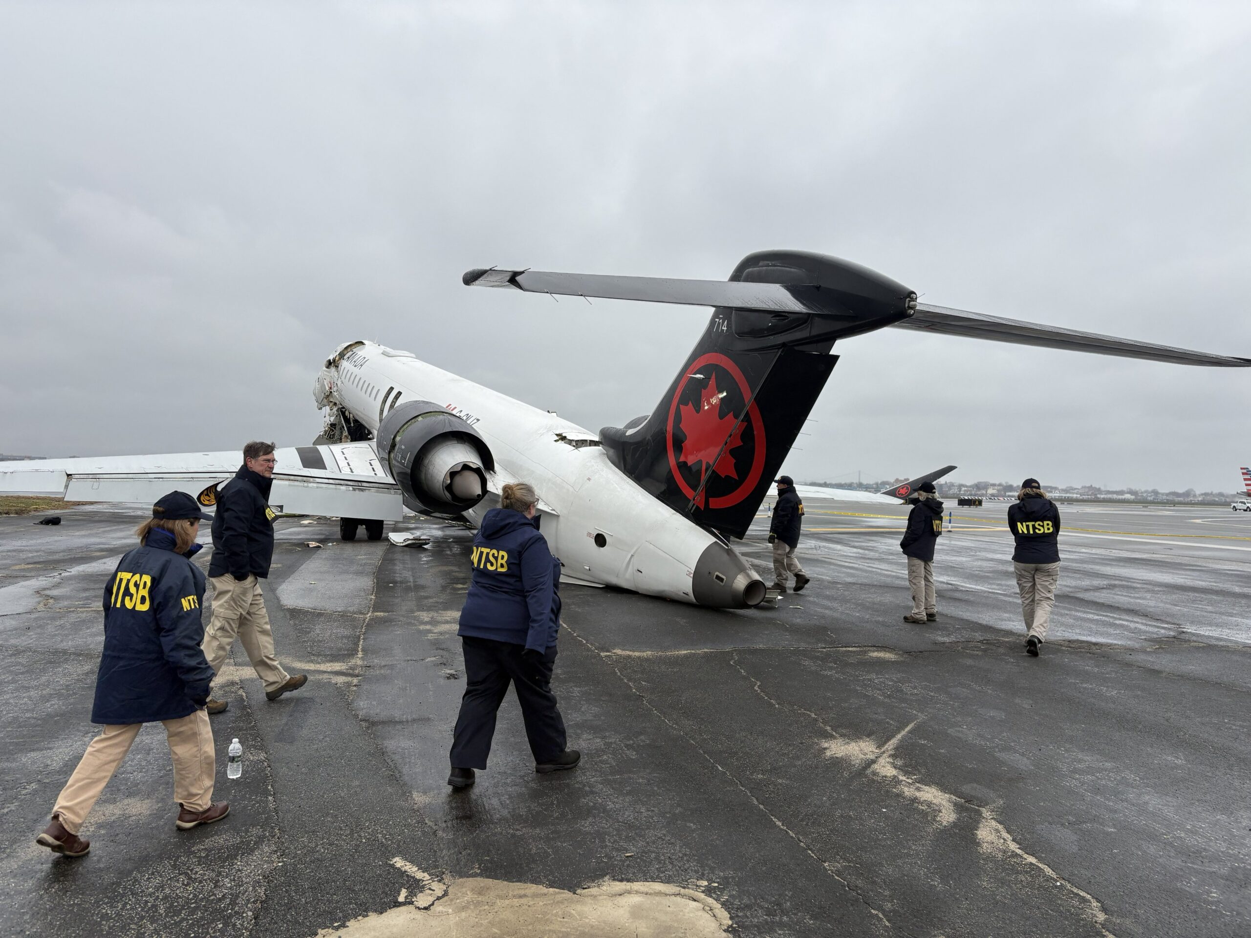 NTSB investigators LaGuardia Airport CRJ 900 fire truck collision